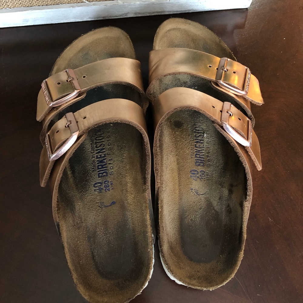 Size 40 used rose gold Arizona Birkenstock’s.